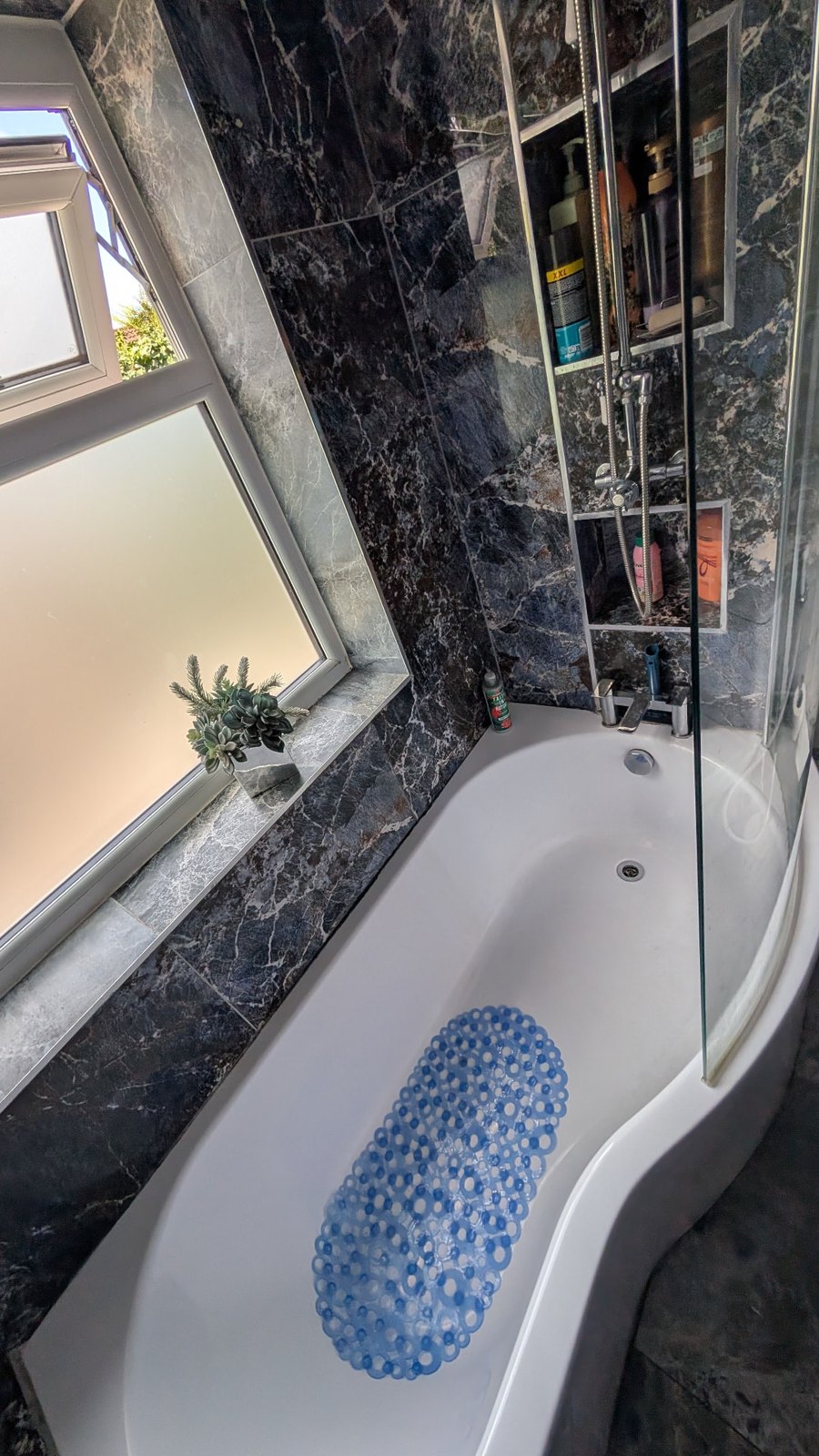 Clean bath, shower screen, tiles and fittings after a Preshine clean